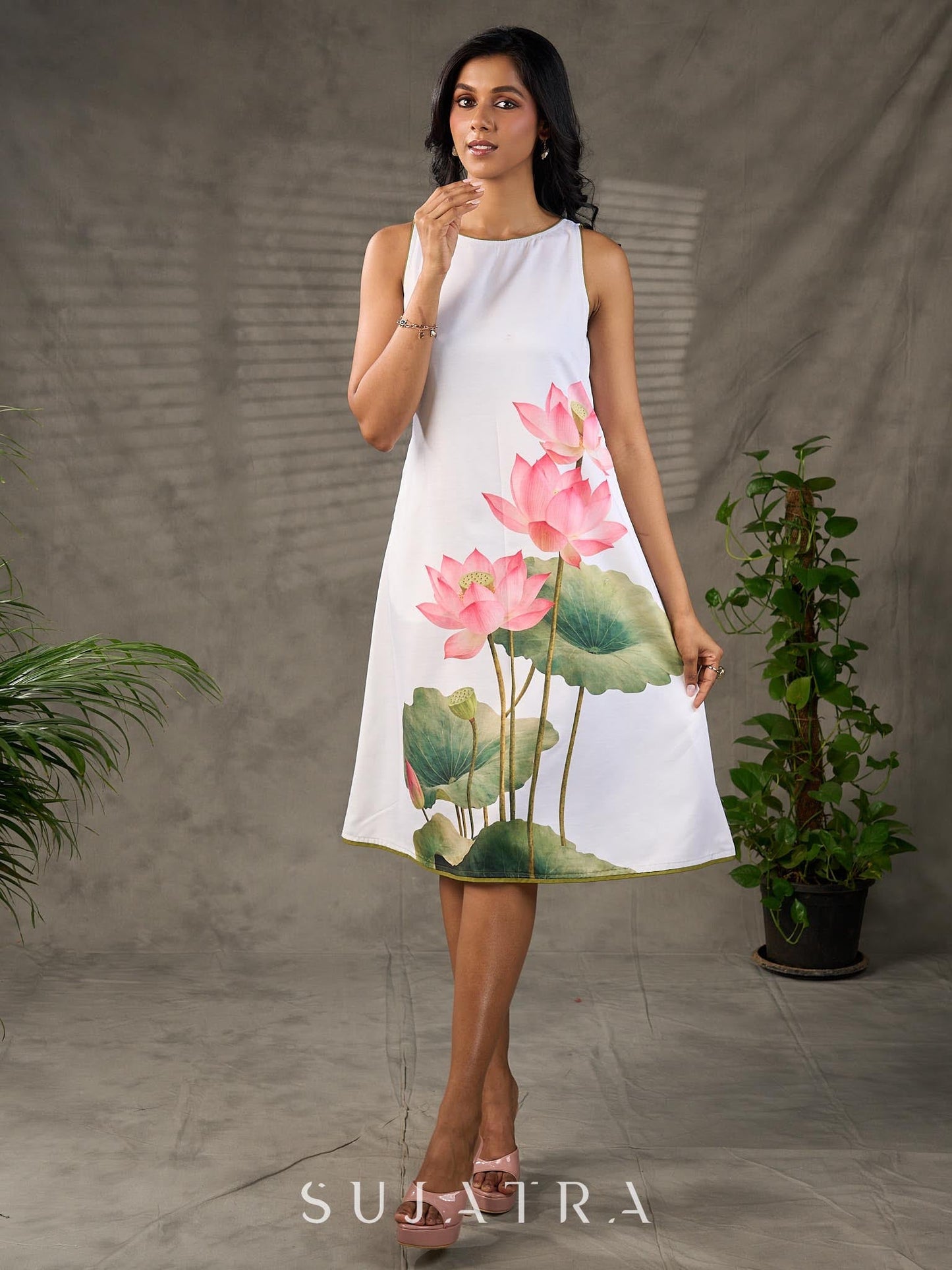 Graceful White lotus printed dress with elegant olive accents.