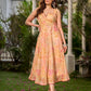 Effortless sunshine yellow floral dress designed with a delicate neckline, gathered straps, and a breezy, flowy form.