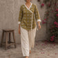 Mustard Jaipur cotton wrap-style Angarkha top with off-white Hakoba cuffs and graceful contrast accents.
