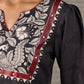 Black Kalamkari-inspired printed dress with maroon accents and pearl embellishments