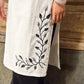 Classic White Cotton Kurta Featuring Black Leaf Vine Embroidery & Printed Sleeve Detail