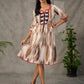 Heritage Pichwai inspired abstract cow motifs dress with red details
