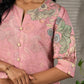 Blush pink Kalamkari printed dress with elegant pleated detailing