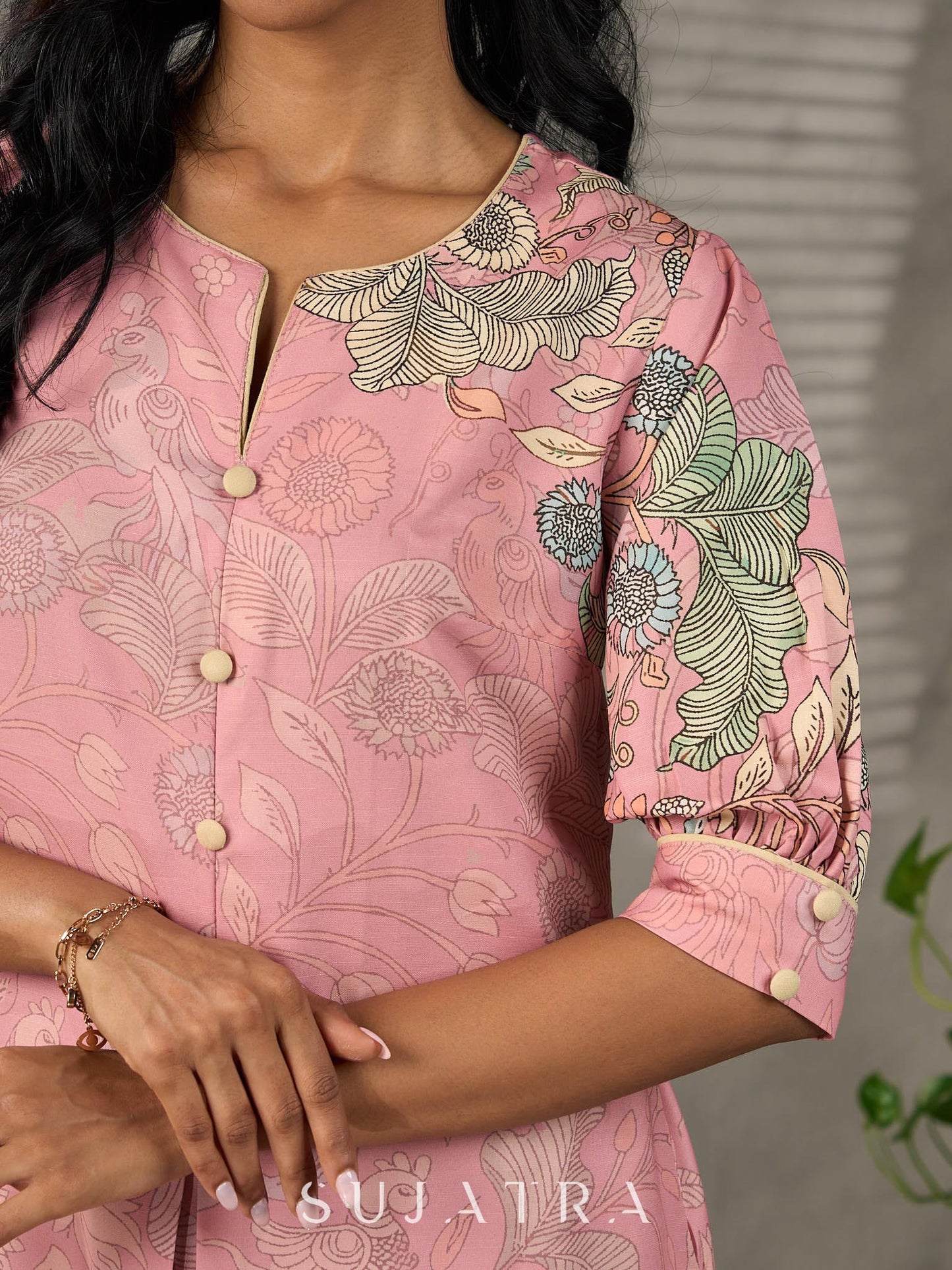 Blush pink Kalamkari printed dress with elegant pleated detailing