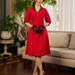 Elegant red dress featuring delicate, hand-painted Madhubani lotus motif detailing.