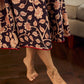 Black and Maroon Elegant Kalamkari Dress with pintuck detailing and flowing bias-cut silhouette.