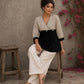 Black Jaipur floral printed yoke top featuring black pintuck body, three-quarter sleeves, and delicate ruffled sleeve edging.
