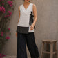 White cotton wrap-style top featuring contrast block print mantra borders, side tie, and modern silhouette.