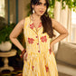 Yellow and white zebra-striped hand block printed sleeveless vintage luxe dress with maroon bird motifs and matching accents for a bold, elegant statement look.