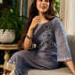Two-tone handloom cotton dress with delicately painted Madhubani fish motifs and pleated hem.