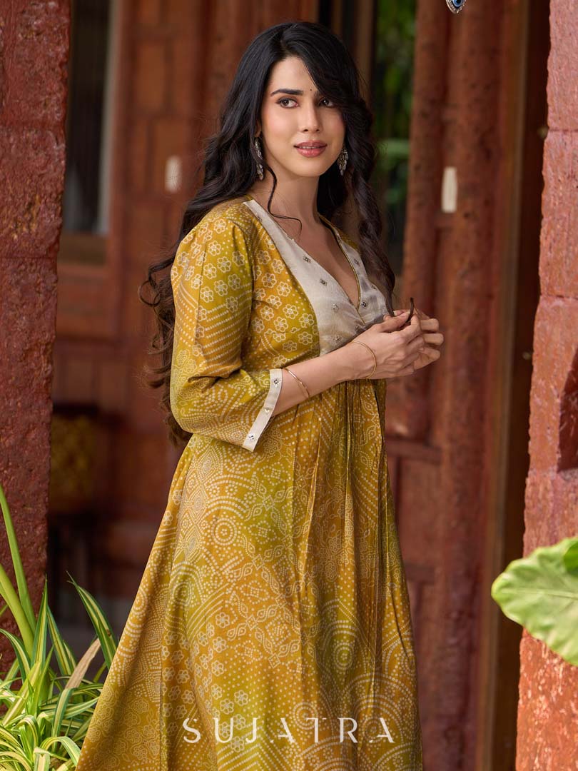 Exquisite yellow Bandhani printed kurta with a delicate off-white tissue overlay and refined accents.