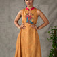Mustard Gond printed mandarin collar dress with vibrant pink accents.