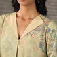Soft green Kalamkari printed collared dress with centre pleat detailing.