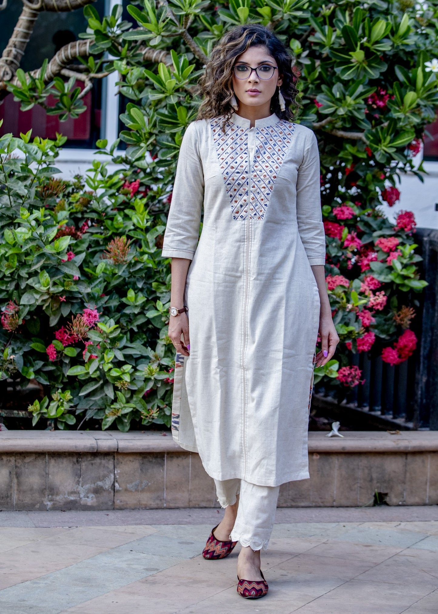 Off-white hand embroidered straight cut handloom cotton kurta with sequence work