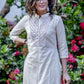 Off-white hand embroidered straight cut handloom cotton kurta with sequence work