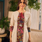 White and black striped dress with Kalamkari panel and tie-up neckline.