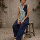 Indigo fish-print crossover sleeveless top featuring a mirror-laced Mandarin collar and beautifully scalloped cut hem.