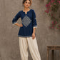 Captivating navy top adorned with a bold, rhythmic block print design, pleated sleeve detailing, and a versatile cut.