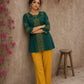Enchanting bottle green tunic featuring a refined, rhythmic Block print motifs, vibrant mustard accents, and a graceful aesthetic.