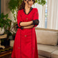 Elegant red dress featuring delicate, hand-painted Madhubani lotus motif detailing.