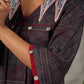 Black Ajrakh printed dress with pleats, maroon accents, and silver embellishments.
