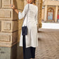 Effortless White Cotton Kurta Adorned with Polka Dot Sleeves & Delicate Scalloped Neckline