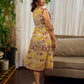 Elegant cream and maroon Madhubani dress featuring sophisticated wavy pintuck flap detailing.