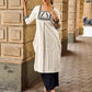 Timeless Off-White Cotton Kurta Featuring Hand Painted Warli Folk Art Yoke & Cuff Band