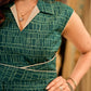 Teal Printed Sleeveless Crossover Midi Designed in a rich teal print, highlighting a crisp notched collar, defined wrap waist, and a fluid flared silhouette.