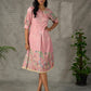 Blush pink Kalamkari printed dress with elegant pleated detailing