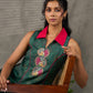 Bottle green Madhubani printed dress with vibrant magenta accents.