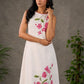 White and pink bougainvillea printed statement dress with pearl embellishments and pink accents