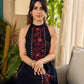 Black bias-cut block print halter dress with a red jaal hand block printed front panel, golden print detailing, and red accents for a striking, elegant statement look.