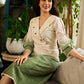 Serene ivory and sage green ombré overlap hakoba dress with olive button accents.