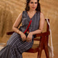 Textured grey Jamdani sleeveless waistcoat with bold red accents and an asymmetrical opening, creating a sharp, modern silhouette with distinctive, fashion-forward appeal.