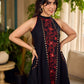 Black bias-cut block print halter dress with a red jaal hand block printed front panel, golden print detailing, and red accents for a striking, elegant statement look.