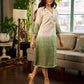 Serene ivory and sage green ombré overlap hakoba dress with olive button accents.