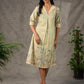 Soft green Kalamkari printed collared dress with centre pleat detailing.