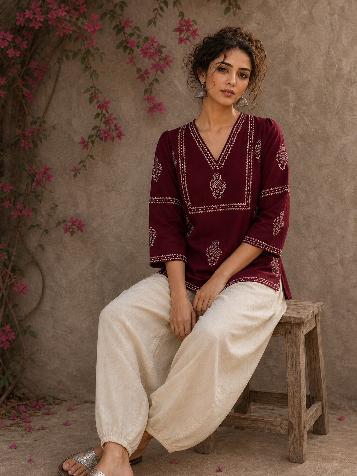 Graceful maroon hand block print top featuring timeless paisley motifs, delicate borders, and an elegant V-neck silhouette, crafted for effortless everyday sophistication.