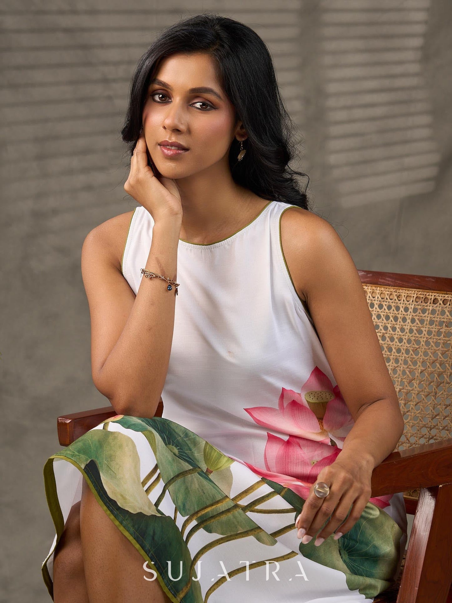 Graceful White lotus printed dress with elegant olive accents.