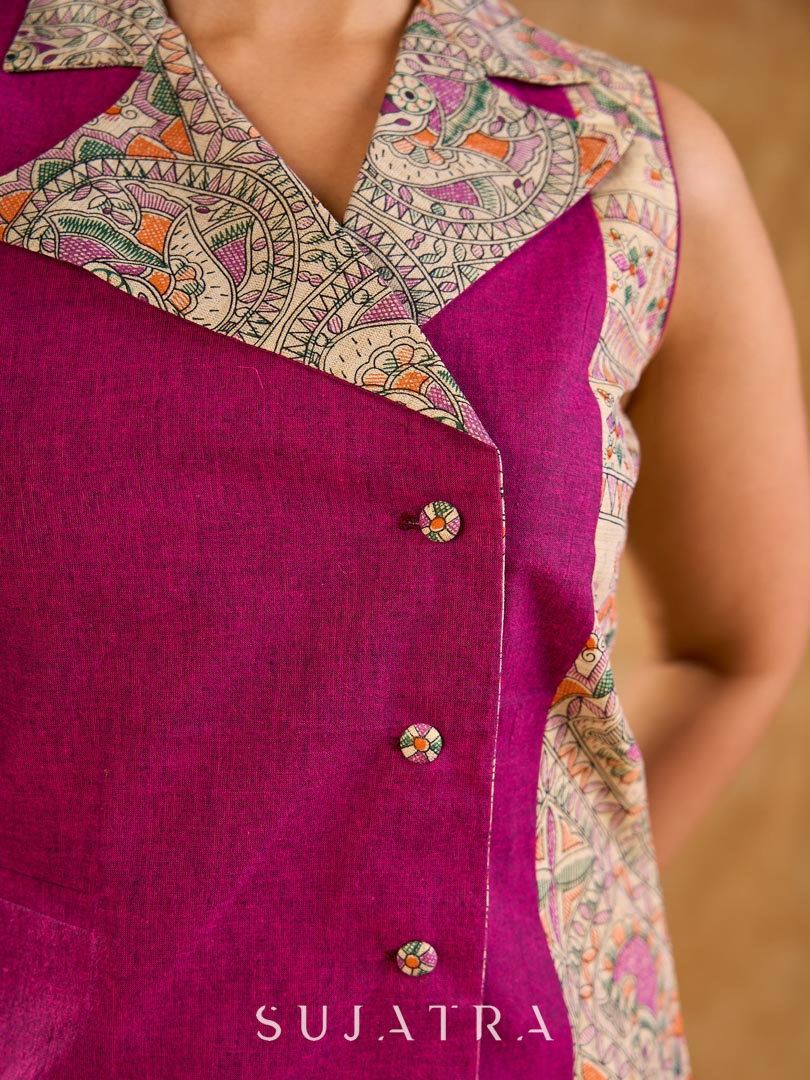 Elegant Madhubani jacket featuring magenta panels, asymmetrical closure, and a notch collar, enhanced with matching accents for a clean, tailored silhouette ideal for elevated corporate wear.