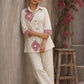 Vibrant ivory hand block print shirt featuring geometric motifs, magenta accents, and a contemporary silhouette inspired by traditional craftsmanship.