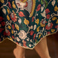 Classic bottle green Kalamkari printed dress with a beige elegant pintuck detailing.