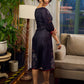 Elegant black Kalamkari-inspired dress with deep maroon accents and graceful floral motifs.