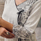 Minimal White Straight Kurta with Monochrome Printed Angrakha Panel & Printed Cuffs