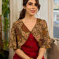 Elegant maroon dress featuring an attached artisan Kalamkari shoulder cape.