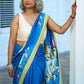 Vibrant Blue Silk Saree with Pichwai Motifs and Floral Border