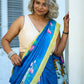 Vibrant Blue Silk Saree with Pichwai Motifs and Floral Border