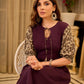 Playful purple cotton dress showcasing floral puff sleeves and box pleats released from the dart for soft volume and flow
