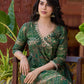 Rich bottle green printed Angrakha with a finely hand-embroidered neckline and soft beige accents.